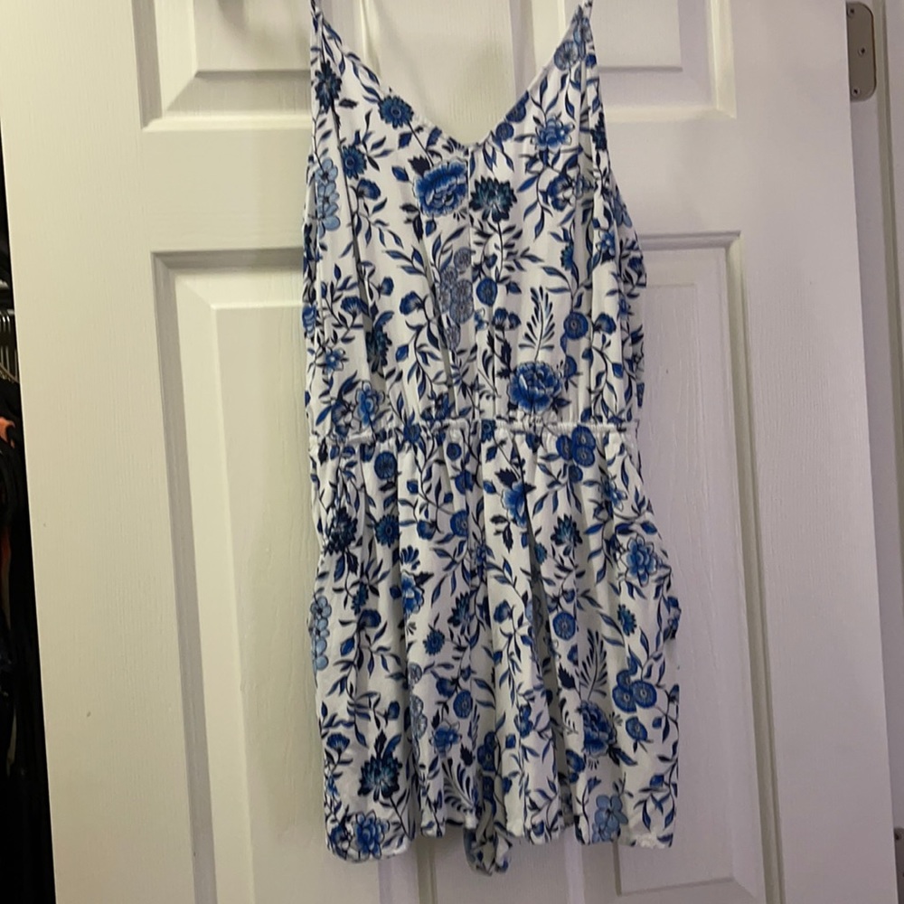 White with blue flower romper